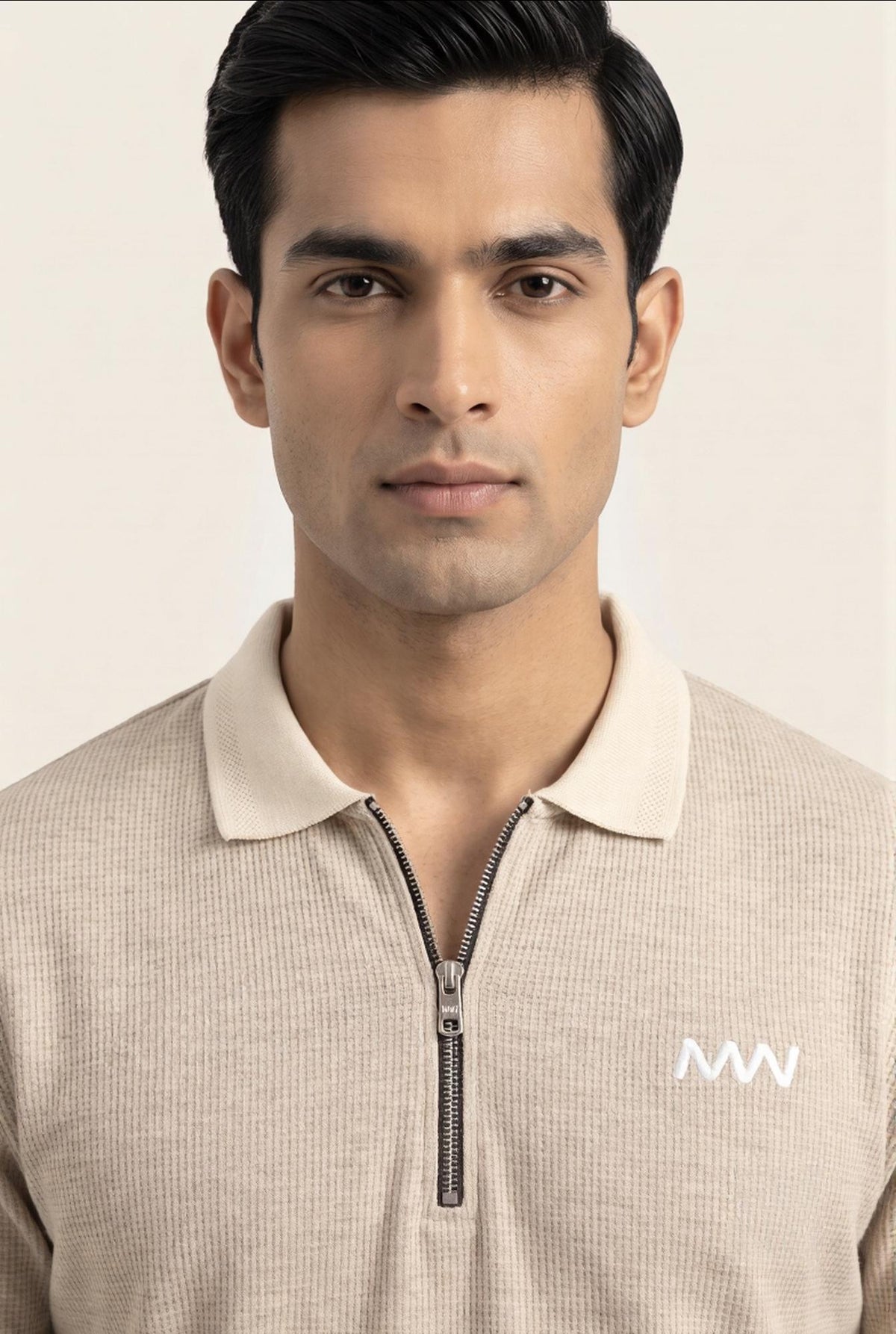 Beige ribbed men's half-zip polo shirt with white logo, modern style for everyday wear