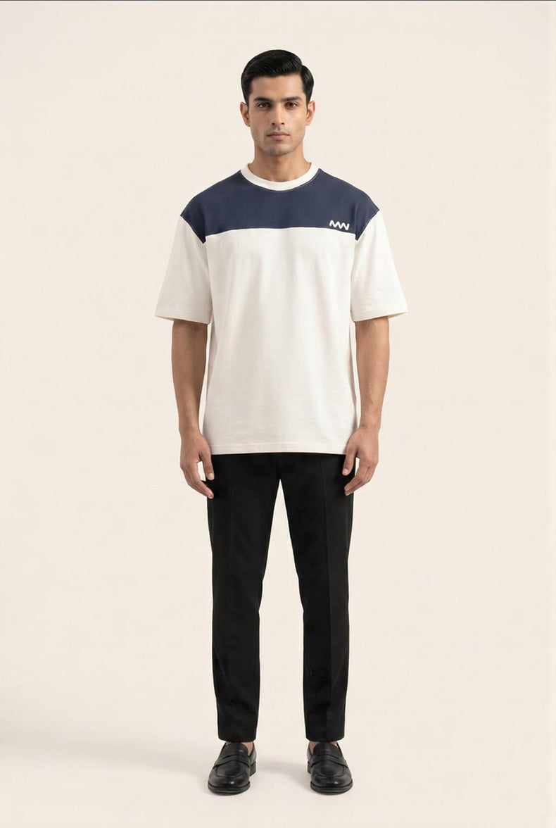 Man wearing MENWEY white and blue panel drop-shoulder T-shirt