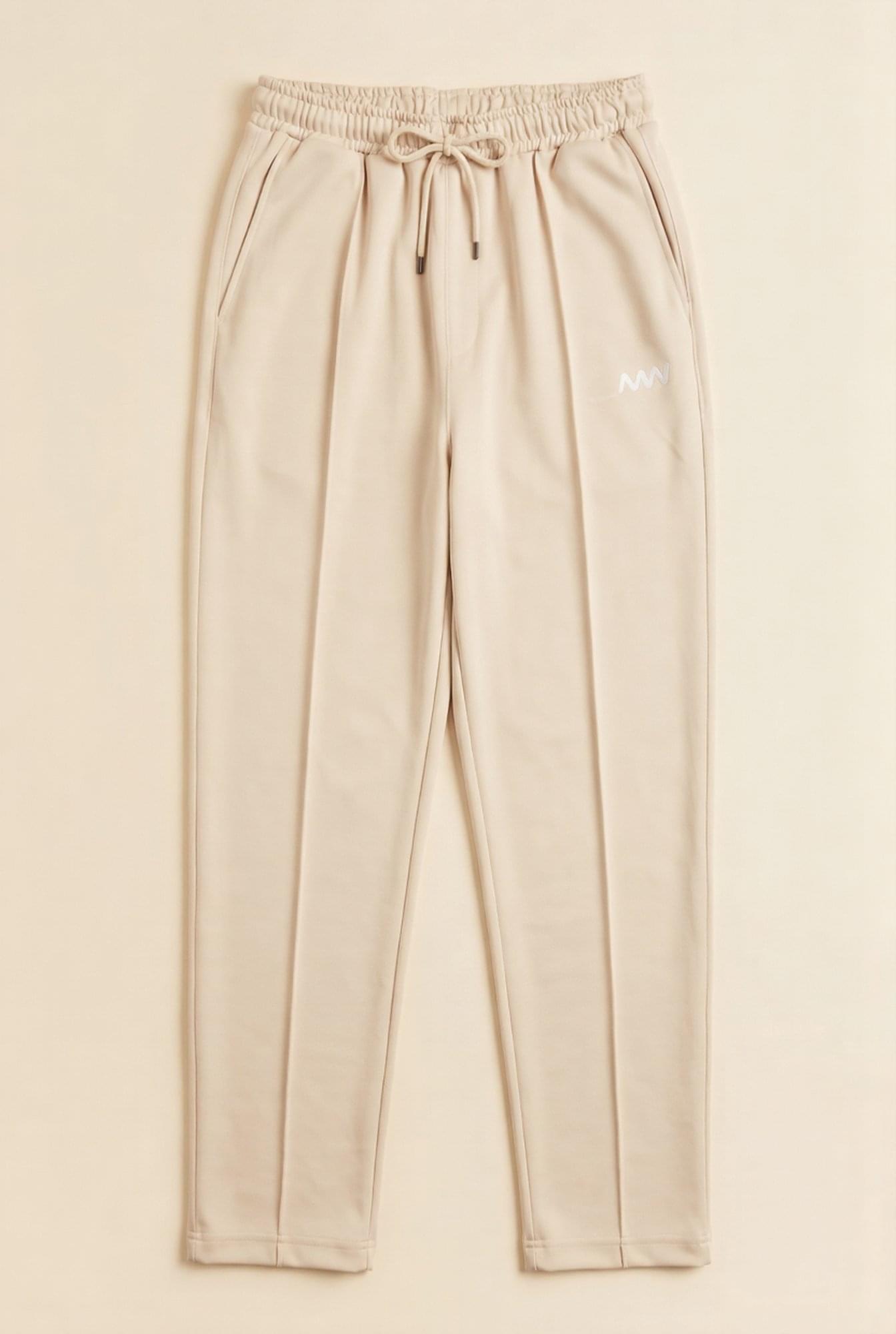 Man wearing MENWEY straight fit center-lined trousers in bone