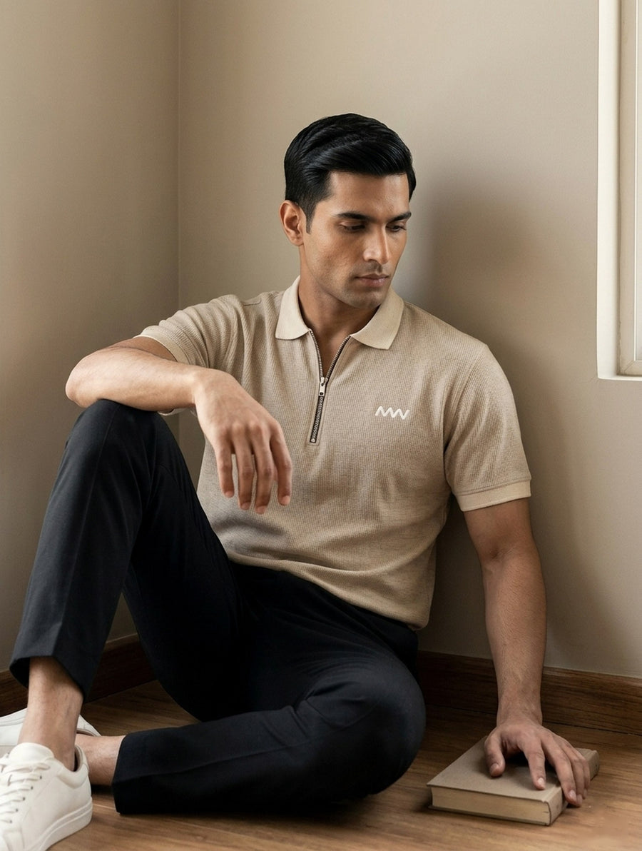 MENWEY Sand Cotton Thermal Zip Polo with Black Straight Fit Trouser — model seated in quiet moment, built with intention